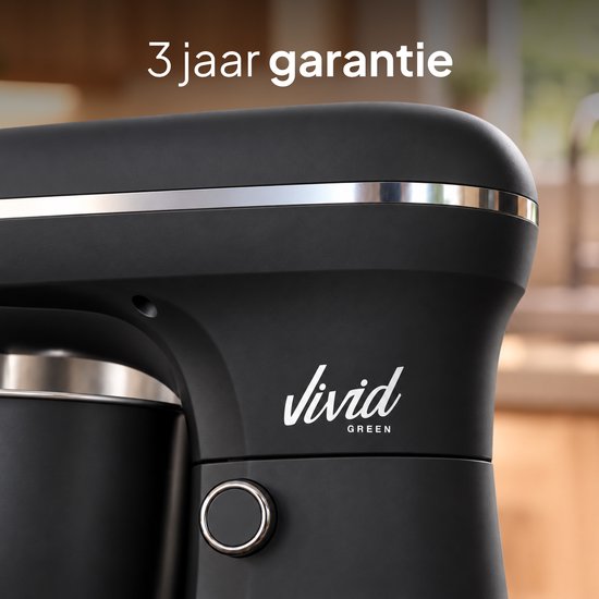 Close-up van de Vivid Green keukenmachine met de tekst 3 jaar garantie erboven.