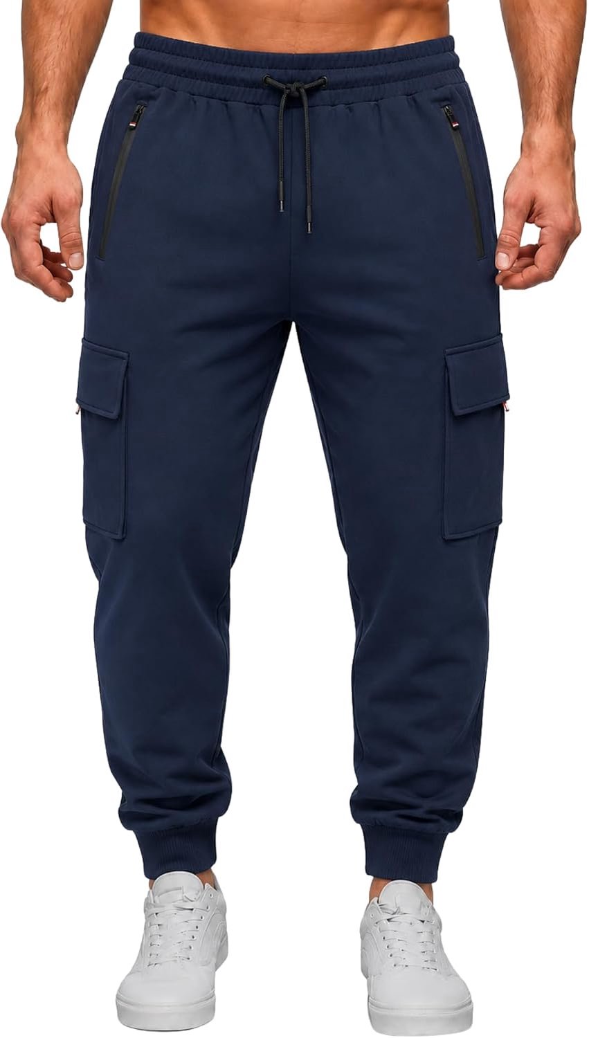 Trainingsbroek voor Heren. Lange Trainingsbroek. Elastische Trainingsbroek met Verstelbaar Koord en Zakken met Ritssluiting.
