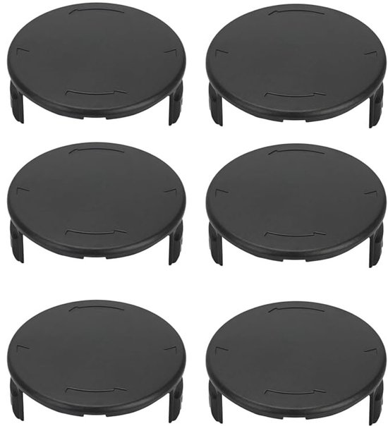 Zes zwarte, ronde deksels met inkepingen aan de zijkant.