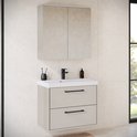 Hangend beige badkamermeubel met twee lades, zwarte handgrepen, witte wastafel en bijpassende spiegelkast.