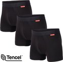 Drie zwarte Tencel boxershorts met elastische band en oranje Undiemeister-label.