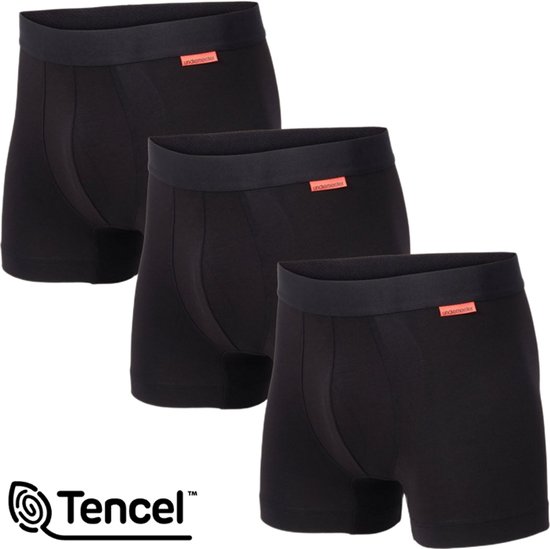 Drie zwarte Tencel boxershorts met elastische band en oranje Undiemeister-label.