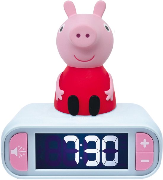 Peppa Pig nachtlampje wekker, vanaf de achterkant gezien. Peppa Pig is roze met een rood jurkje.