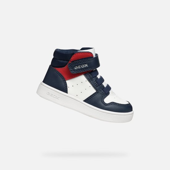 Baskets montantes pour enfant en cuir bleu marine, blanc et rouge. Fermeture par bride velcro.
