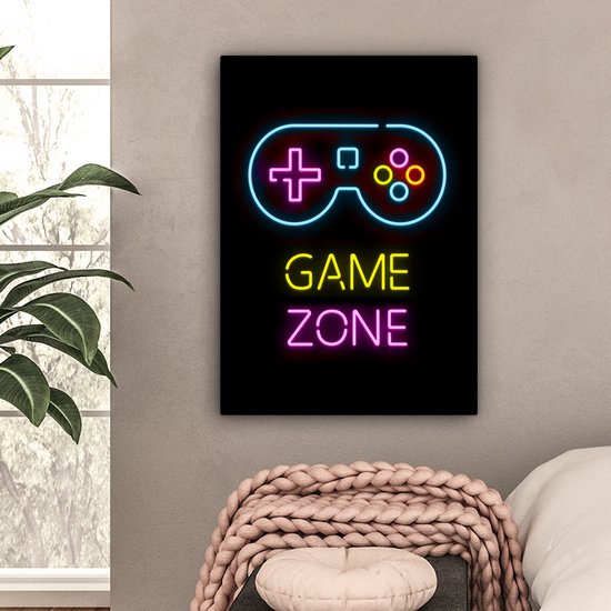 Toile noire avec néons : manette bleue, texte jaune 'GAME', texte rose 'ZONE', près d'une fenêtre.