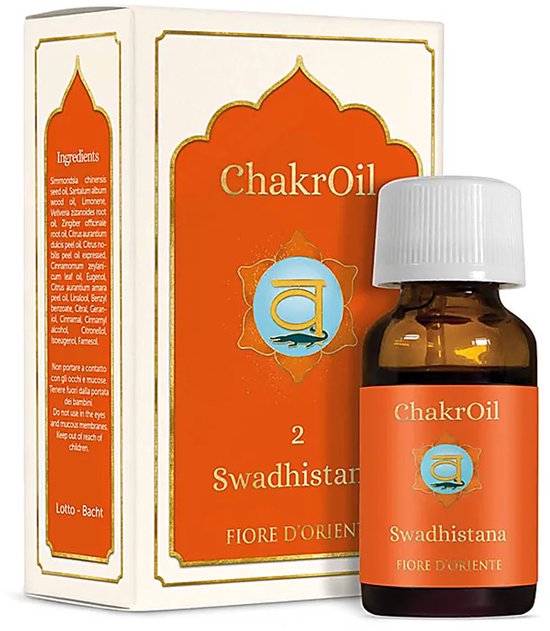 Oranje kartonnen doosje en bruin glazen flesje "ChakrOil 2 Svadhisthana Fiore d'Oriente" opdruk.