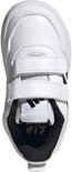 Witte peuterschoen met klittenbandsluiting en zwarte adidas strepen, van bovenaf gezien.
