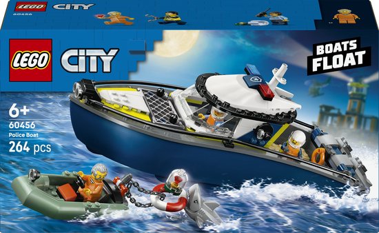 Doos met LEGO City Politieboot, 264 stuks. Een blauwe politieboot met witte opbouw en geel accent, met rubberboot, haai en reddingsboei.