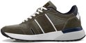 Groene PME Legend sneaker met witte strepen en donkerblauwe details, van de zijkant gezien.