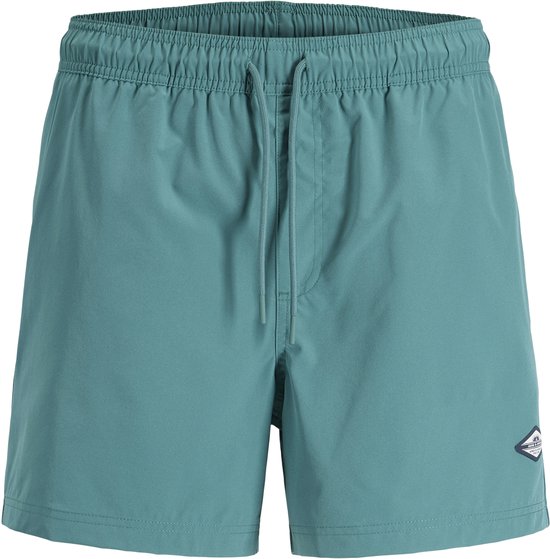 Turquoise zwemshort met elastische tailleband, trekkoord en een logopatch op de linkerzoom.