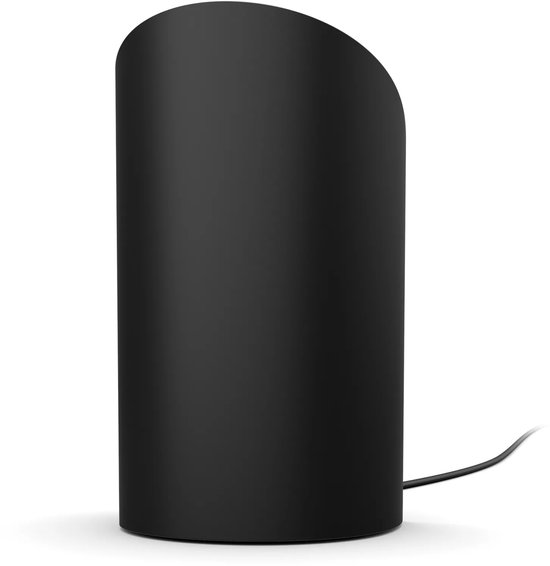 Une lampe de table Philips Hue Play noire avec un abat-jour incurvé en verre et un cordon.