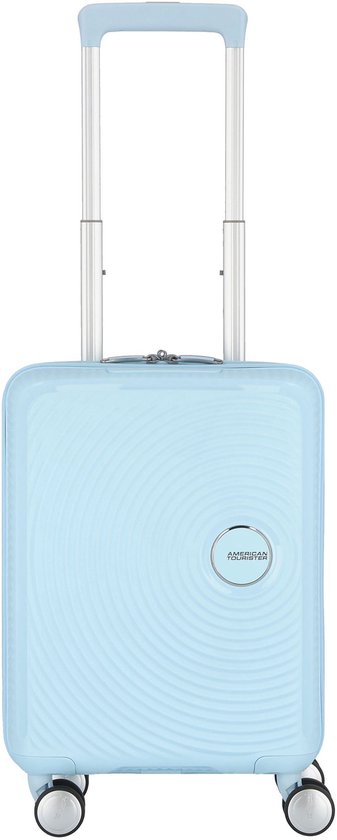 Lichtblauwe spinner koffer met cirkelvormige textuur en American Tourister logo.