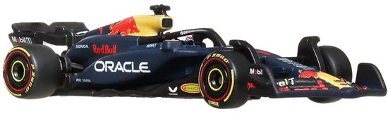 Voiture de course F1 Hot Wheels Oracle Red Bull Racing RB20, bleu foncé, rouge et jaune, sur fond blanc.