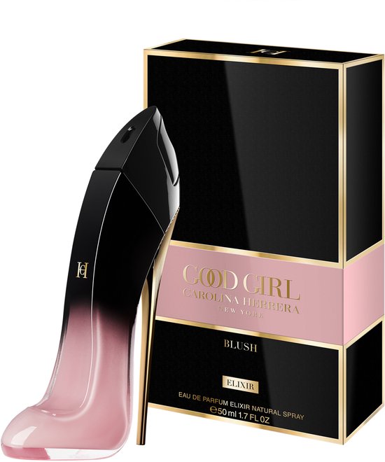 Zwarte parfumdoos met roze band en 'Good Girl Blush Elixir' tekst. Naast de stiletto parfumfles.