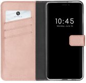 Selencia Hoesje - Geschikt voor Apple iPhone 13 Pro Max - Echt Lederen Bookcase - Roze