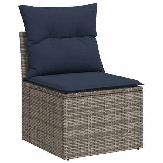 Grijze polyrotan zitmodule met donkerblauwe kussens.