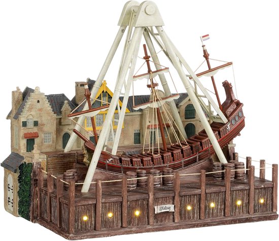 Luville Efteling Halve Maen attractie in een kerstdorp huisje.