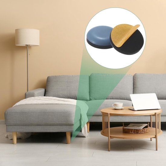 Een grijze bank in een woonkamer, met een groene lijn die naar een cirkel wijst met twee grijze meubeldopjes, waarvan één de zelfklevende achterkant toont.