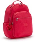Sac à dos Kipling rouge avec porte-clés singe rouge, une poche avant zippée et des poches latérales.