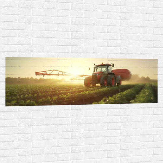 Muursticker - Rood Landbouwvoertuig in Actie bij Groene Gewassen - 150x50 cm Foto op Muursticker