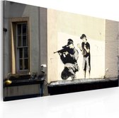 Schilderij - Sniper and boy (Banksy).