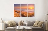 Schilderij - Duinen en strand bij zonsondergang  Texel, 120x80cm ,  3 luik , Wanddecoratie