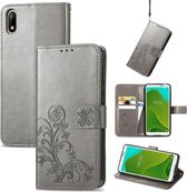Voor Wiko Jerry 4 Vierbladige Sluiting Reliëf Gesp Mobiele Telefoon Bescherming Lederen Case met Lanyard & Card Slot & Portemonnee & Beugel Functie (Grijs)