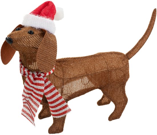 Teckel en tissu marron pour décorations de Noël, portant un bonnet de Père Noël et une écharpe rayée rouge et blanche, debout.