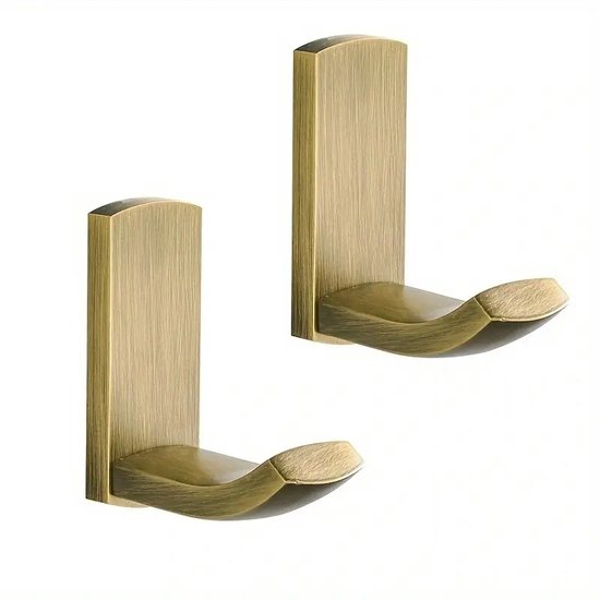 Twee antiek messing kledinghaken met gebogen haken.
