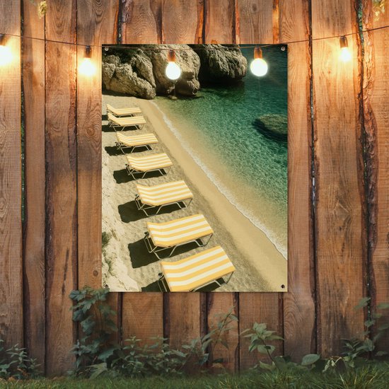 Tuinposter 90x120 cm - Tuindecoratie Strandbedden - Zee - Stenen - Baai - Poster voor in de tuin - Buiten decoratie - Schutting tuinschilderij - Tuindoek muurdecoratie - Wanddecoratie balkondoek