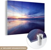 MuchoWow® Glasschilderij 60x40 cm - Schilderij acrylglas - Zonsondergang met kalme kleuren op het strand - Foto op glas - Schilderijen