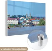 MuchoWow® Glasschilderij 90x60 cm - Schilderij acrylglas - Uitzicht op Paramaribo vanaf een rivier - Foto op glas - Schilderijen