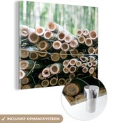 MuchoWow® Glasschilderij 90x90 cm - Schilderij acrylglas - Stapel gesneden bamboe Arashiyama - Foto op glas - Schilderijen