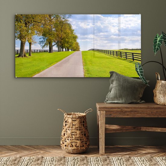 MuchoWow® Glasschilderij 120x60 cm - Schilderij acrylglas - Wolken - Bomen - Weg - Foto op glas - Schilderijen