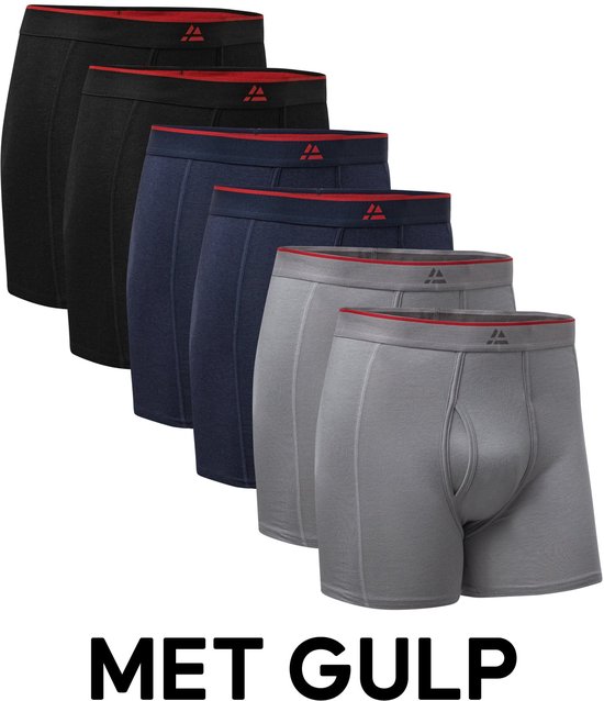 Vijf heren boxershorts in zwart, donkerblauw en grijs, met rode bies aan de tailleband. Tekst: 'MET GULP'.