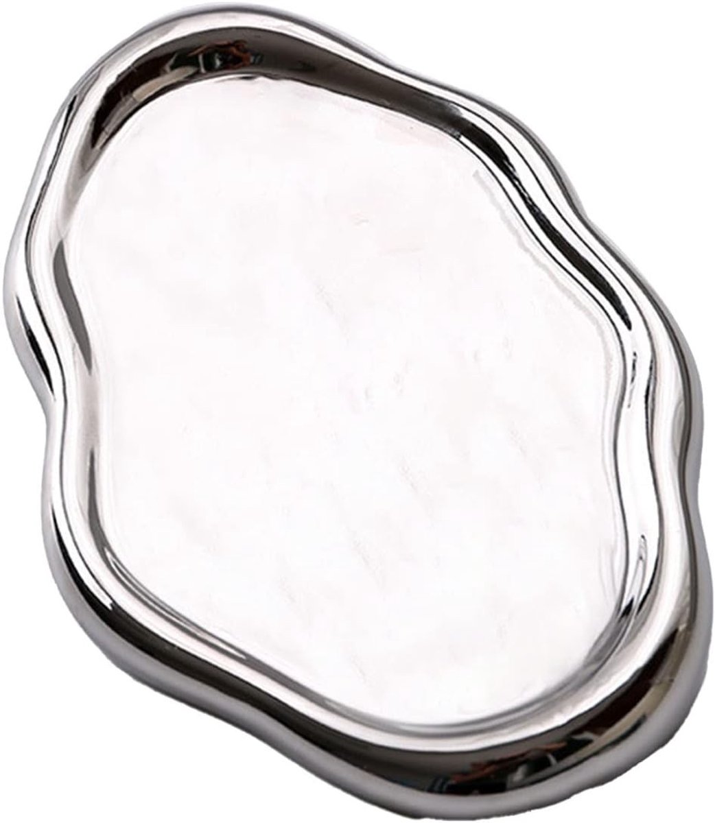 Moderne ovale keramische sieraden dienblad met glanzende zilverkleurige afwerking voor decoratie en opberging