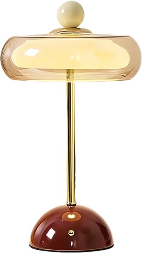 Lampe de table rétro marron avec abat-jour ambre et tige dorée, sur fond blanc.