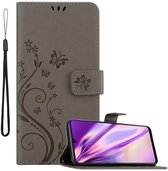 Cadorabo Hoesje geschikt voor Samsung Galaxy A42 5G / M42 5G in BLOEMEN GRIJS - Beschermhoes in bloemmotief met magnetische sluiting, standfunctie en kaartsleuven Book Case Cover Etui