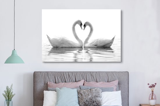 Canvas schilderij 150x100 cm - Wanddecoratie Twee zwanen die samen een hart vormen - zwart wit - Muurdecoratie woonkamer - Slaapkamer decoratie - Kamer accessoires - Schilderijen