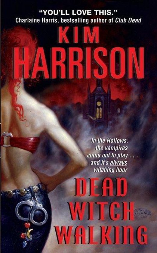 Boekomslag van "Dead Witch Walking" met een vrouw op de voorgrond en een gotische kerk op de achtergrond.