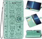 Voor Sony Xperia L4 schattige kat en hond reliëf horizontale flip lederen tas met beugel / kaartsleuf / portemonnee / lanyard (groen)