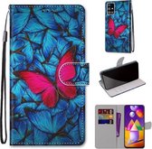 Voor Samsung Galaxy M31s Gekleurde tekening Cross Texture Horizontale Flip PU lederen tas met houder & kaartsleuven & portemonnee & lanyard (grote rode vlinder op blauw)