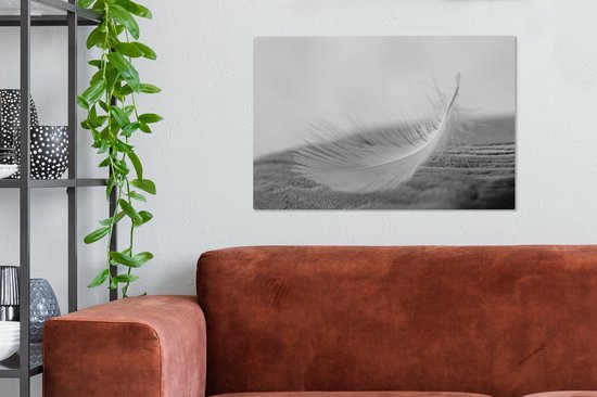 Tableau sur toile Gros plan d'une plume tourbillonnante - 60x40 cm - Décoration murale