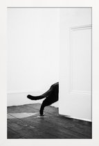 JUNIQE - Poster in houten lijst Sneaking Out -20x30 /Wit & Zwart