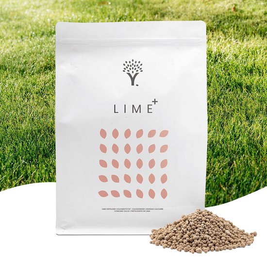 Emballage blanc avec logo 'Y. LIME+' et motif ovale rose. À côté de l'emballage se trouve un tas de granulés de chaux.