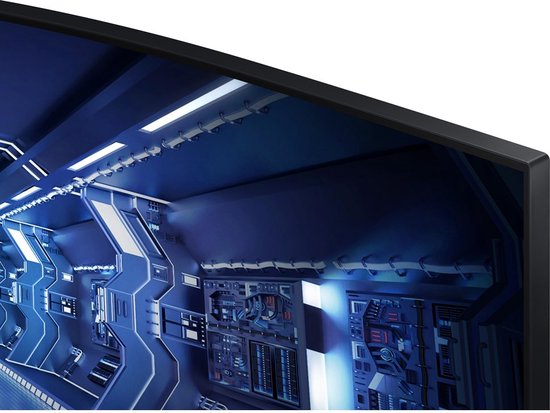 Close-up van de gebogen rand van een zwarte Samsung monitor met een blauw futuristisch interieur.