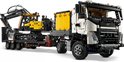 LEGO Technic Volvo FMX truck met gele graafmachine op dieplader.