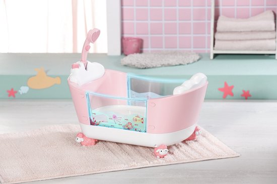 Roze babybadje met transparante badrand met zeedieren en witte schaapjesvoetjes.