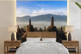 Papier peint - Papier peint Papier peint photo Borobudur dans un matin brumeux en Indonésie - Largeur 220 cm x Hauteur 220 cm