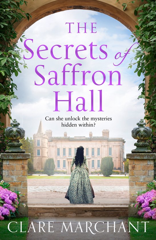 Boekcover 'The Secrets of Saffron Hall' met een vrouw in een groene jurk die naar een groot landhuis kijkt.